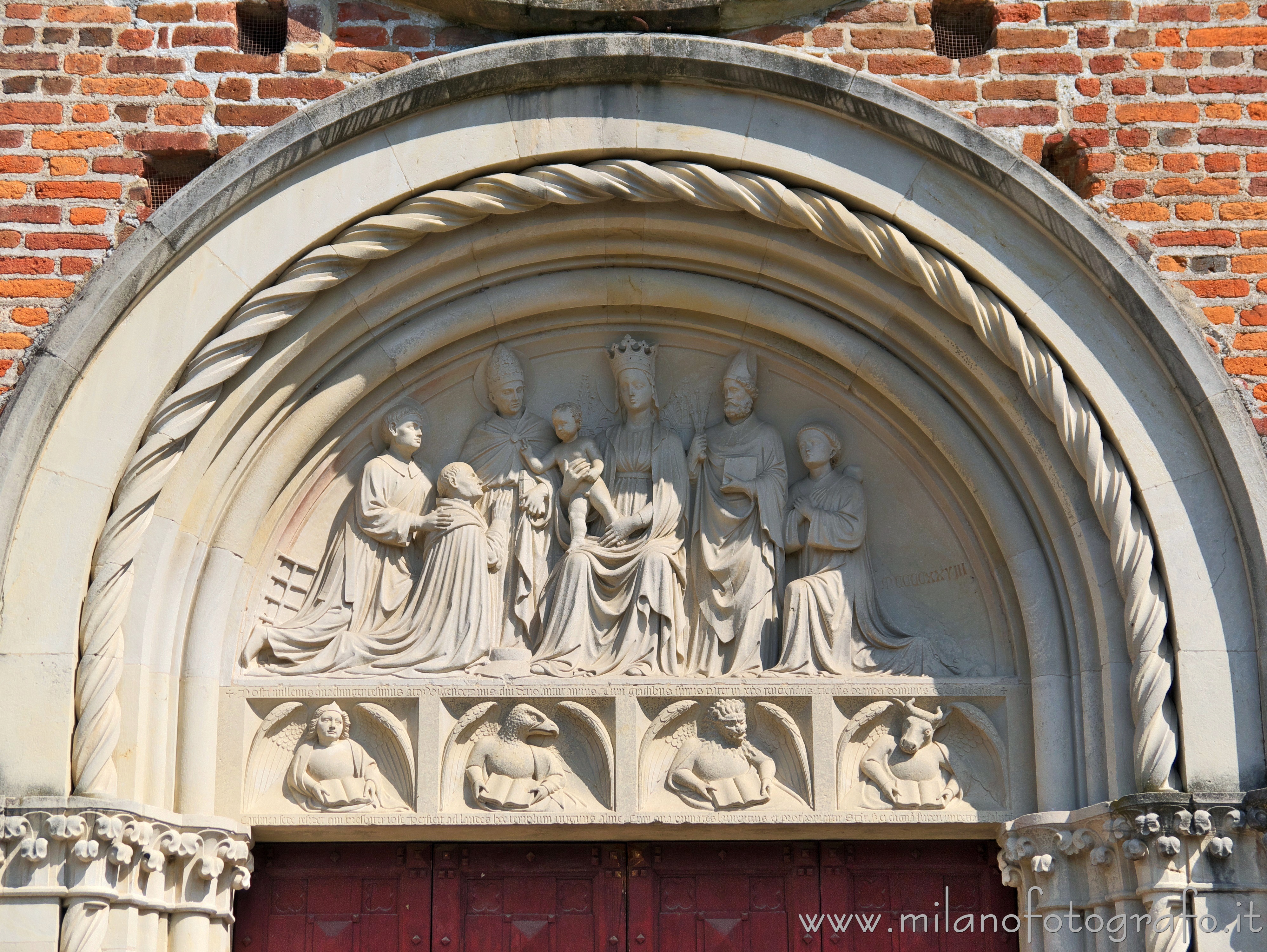 Castiglione Olona (Varese, Italy) - Lunette of the portal of the Collegiate Church of Saints Stephen and Lawrence